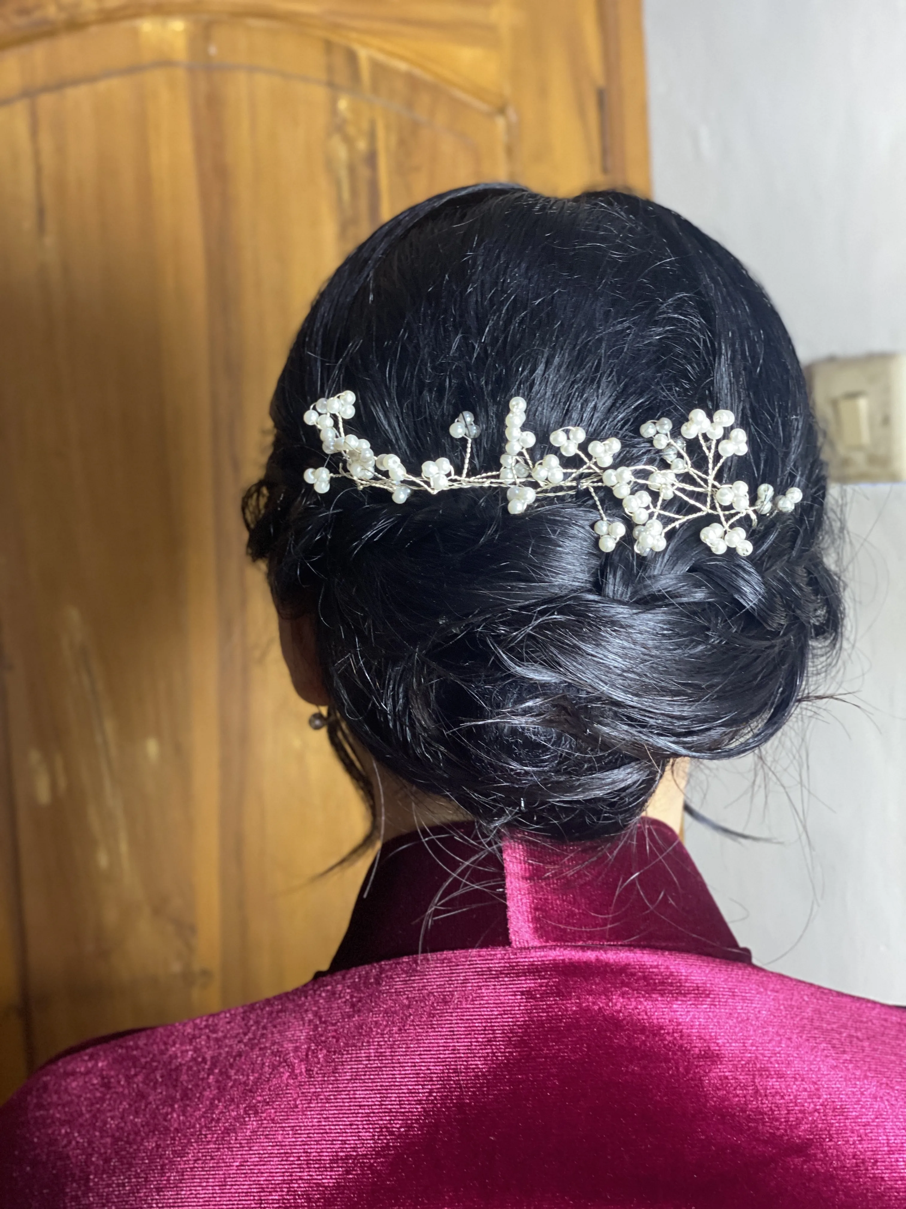 Hairdo — side swept updo