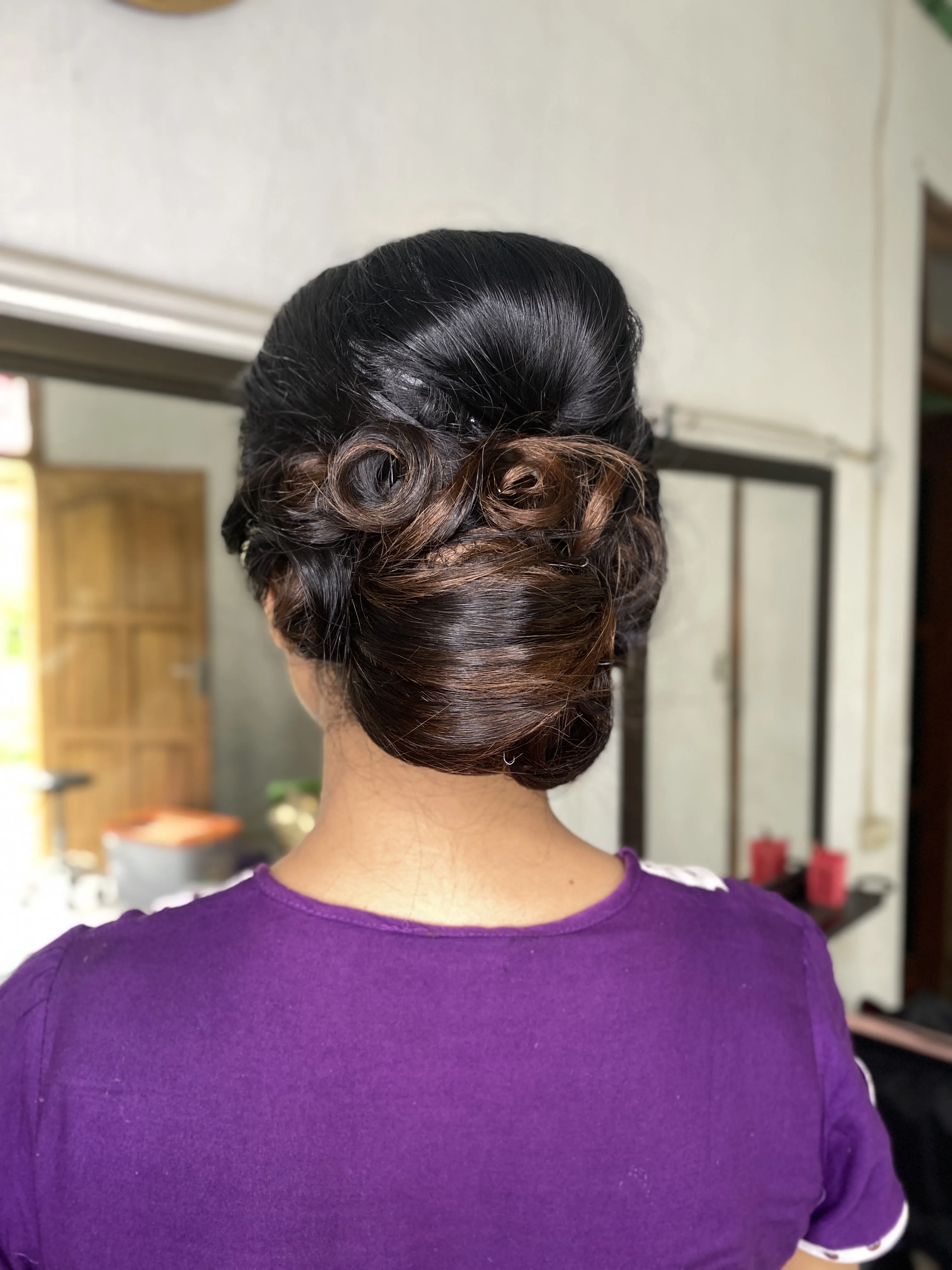 Sanggul Kreasi — floral accent updo